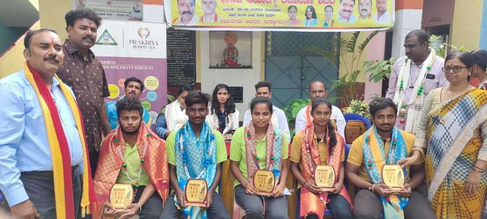 Our students being felicitated for conducting free health camps