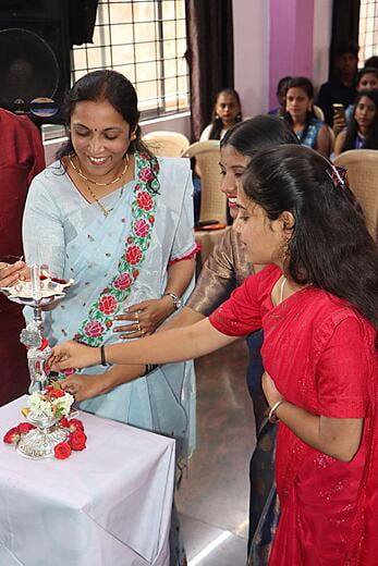 Our Pricipal Lighting the Lamp